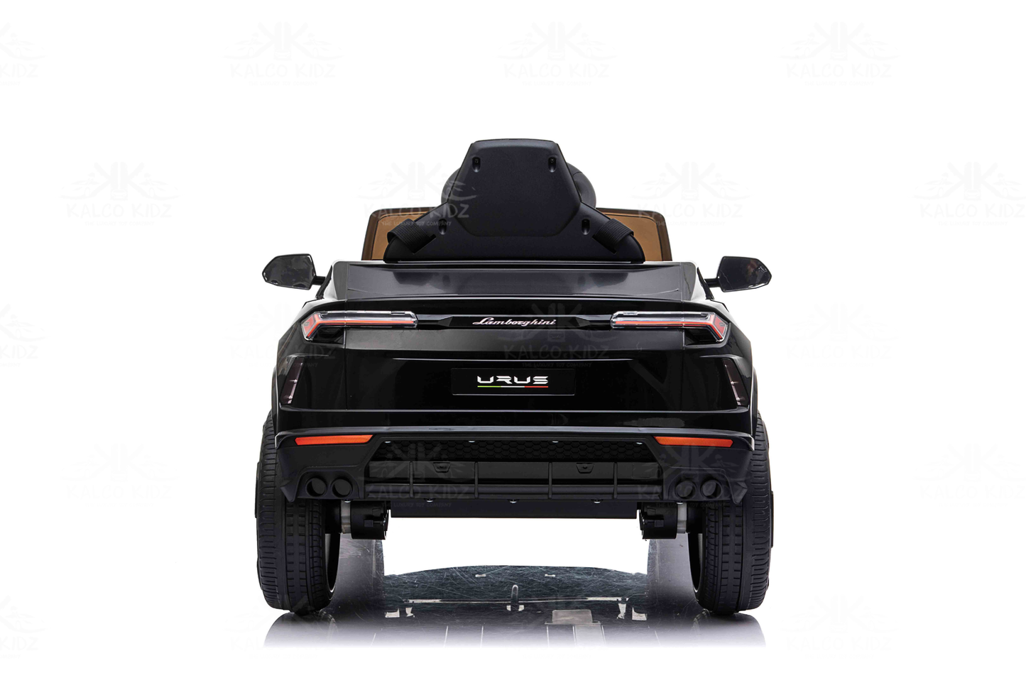 Back view of a black Lamborghini Urus SUV on a white background