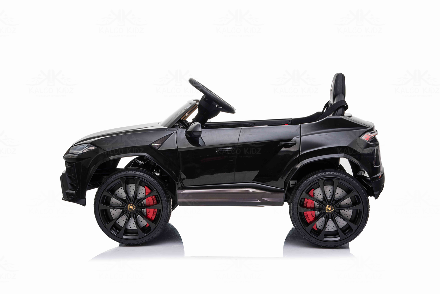 Black toy car with red accents on a white background