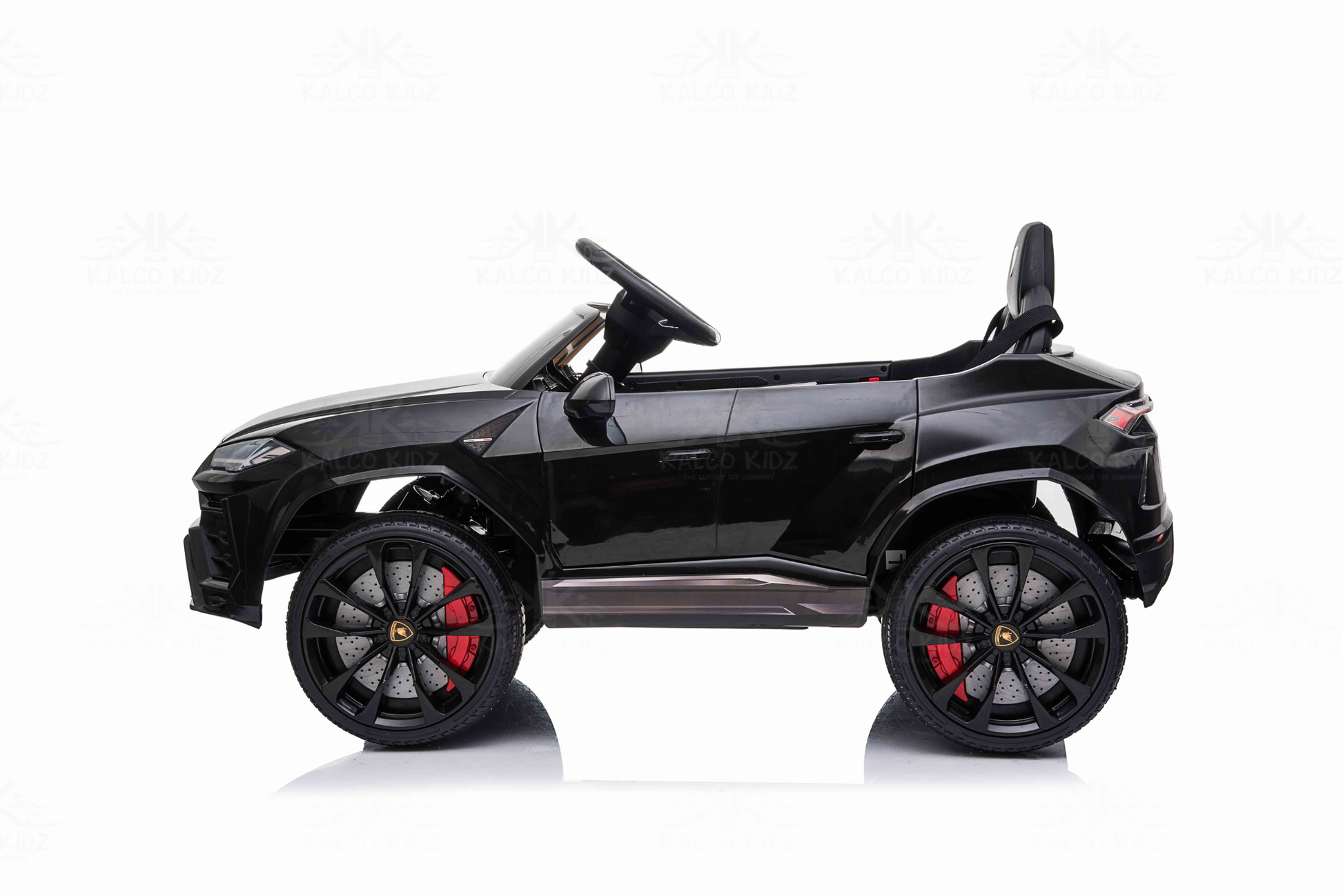 Black toy car with red accents on a white background